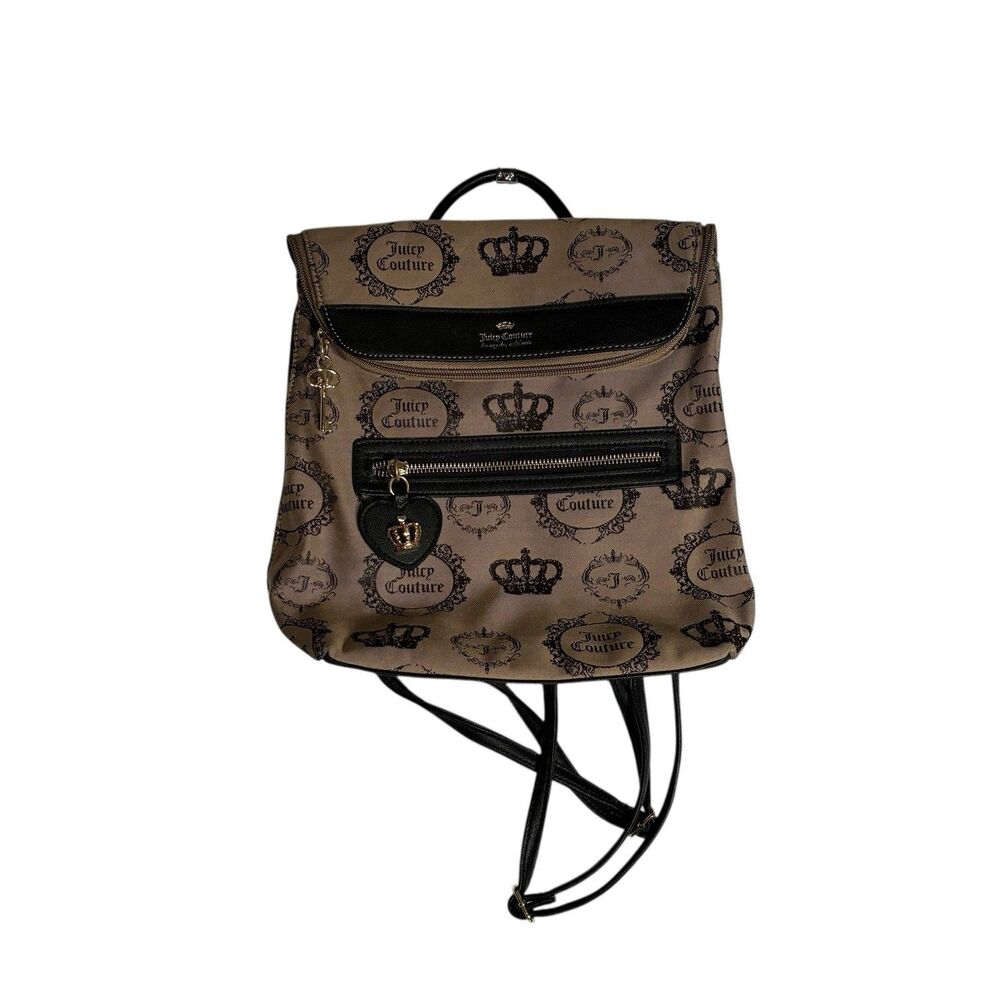 A Juicy Couture tan And Black Medium Backpack With Crown And Key. Fold Over Top